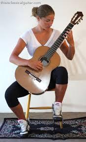 Women playing the guitar