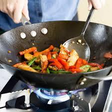 a wok cooking vegtables