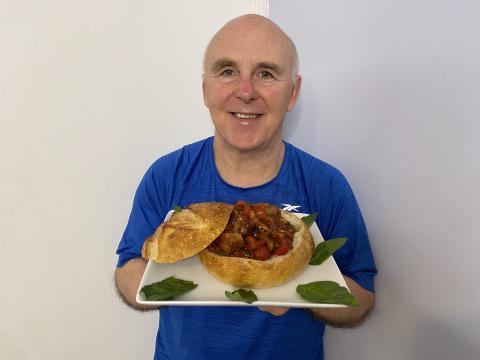 Sausage, Pepper, and Onions in a Crusty Bread Bowl