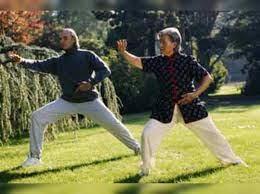 two people doing tai chi